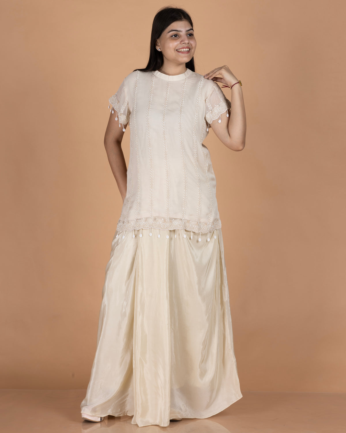 Pearl-Embroidered Organza Top with Shell Tassels & Pure Crepe Draped Skirt Indo-Western Set